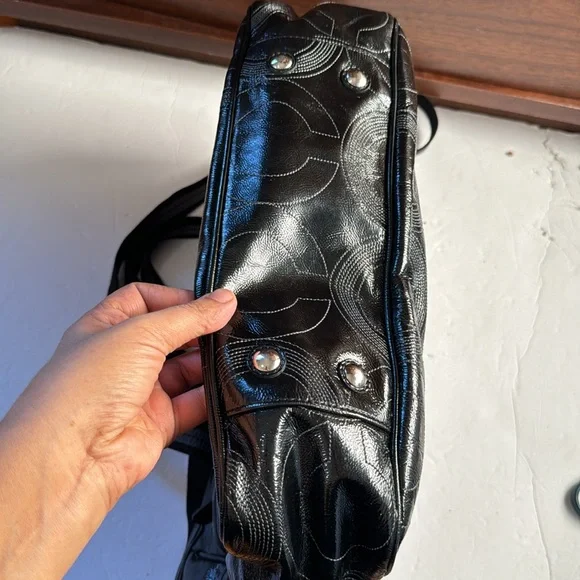 Leather coach diaper bag best sale